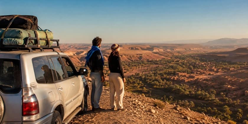 Four wheel drive vehicle in the desert landscape near Merzouga