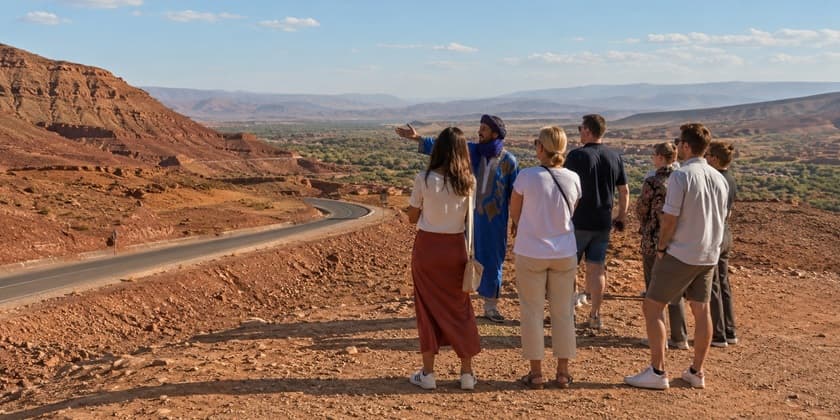 Travelers admiring the scenery on an organized Morocco journey